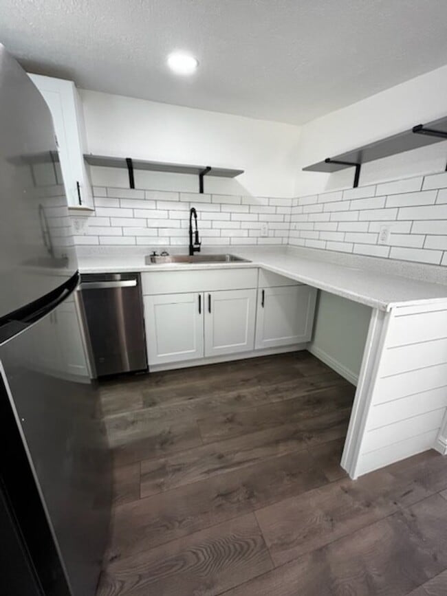 Building Photo - Brand New Updated studio home is a must se...