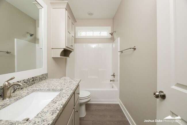 Building Photo - Now Pre-Leasing — Brand-New Luxury Townhomes Near the University of Arkansas! Avail. 8/7/26