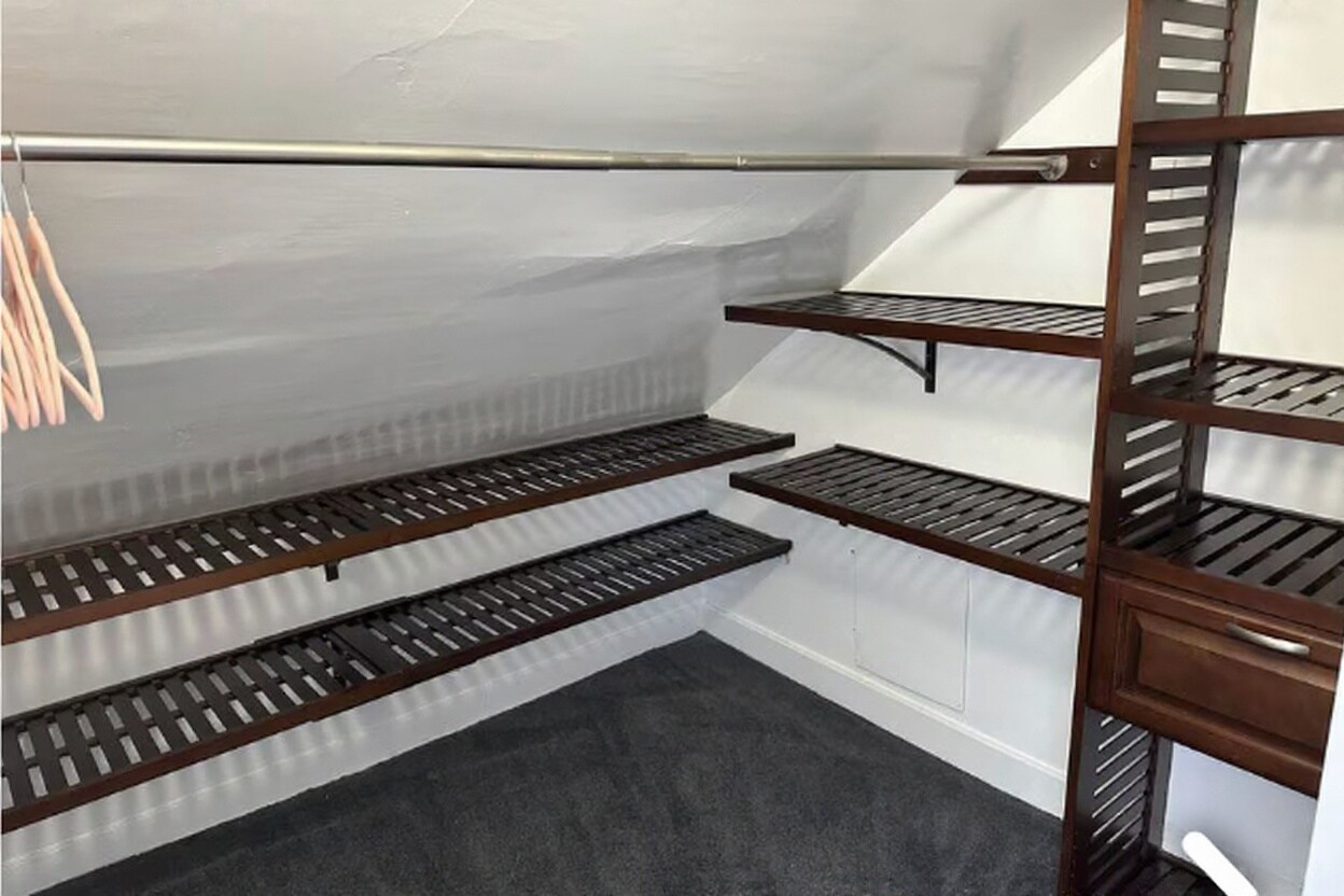 Custom shelving in walk in closet - 167 Wilson St