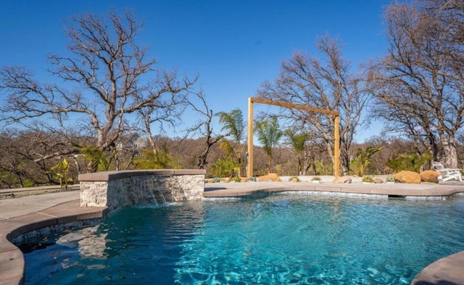 Building Photo - A Private Oasis with Unmatched Amenities 4...