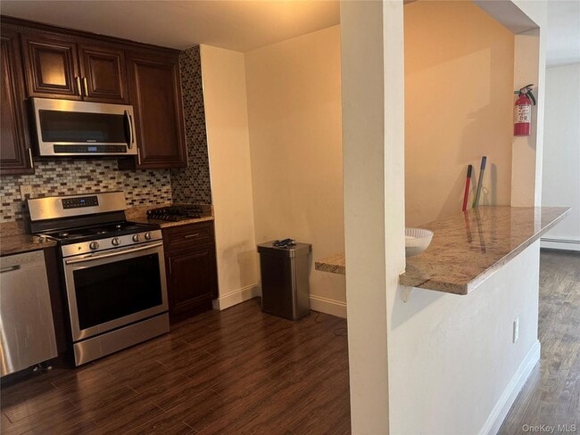 Building Photo - 15649 76th St Unit 2
