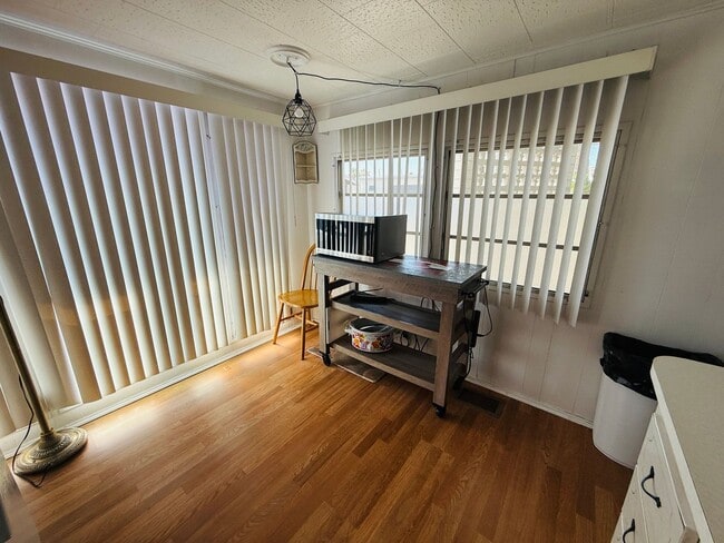 Building Photo - Beautiful fully furnished one bedroom, one bath manufactured home in a 55+ deed restricted gated ...