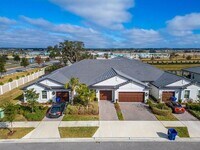 Building Photo - Luxury 55+ Villa with Lagoon Access in Med...