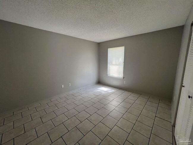 Building Photo - 6809 Tiki Ln