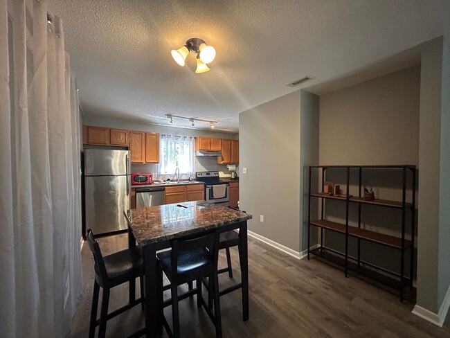 Building Photo - Adorable, Completely Furnished & Updated 2...