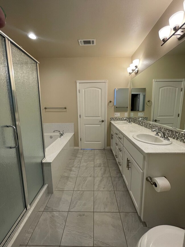 Building Photo - Four Bedroom, Two and a Half Bath Home