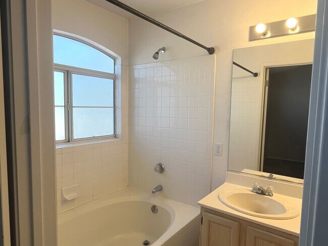 Building Photo - 2 bed, 2 bath condo located in gated community w/lush landscaping, 2 pools, spas, BBQ areas & clu...