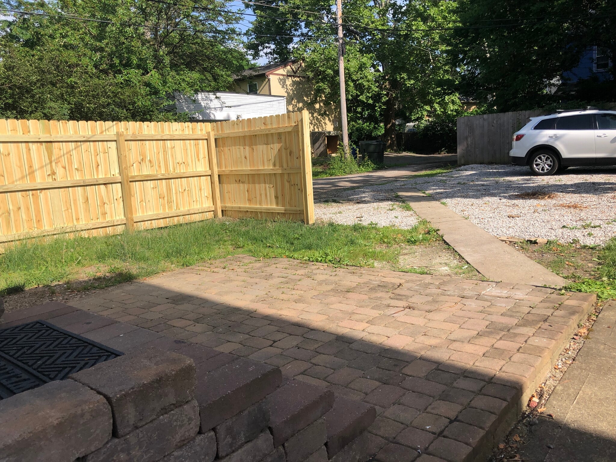 Back paver patio with privacy fence and lots of private parking! - 131 Clinton St