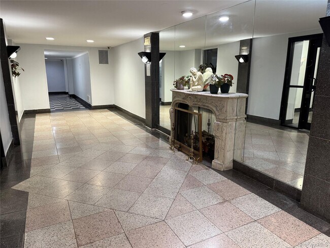 Building Photo - 76-10 34th Ave