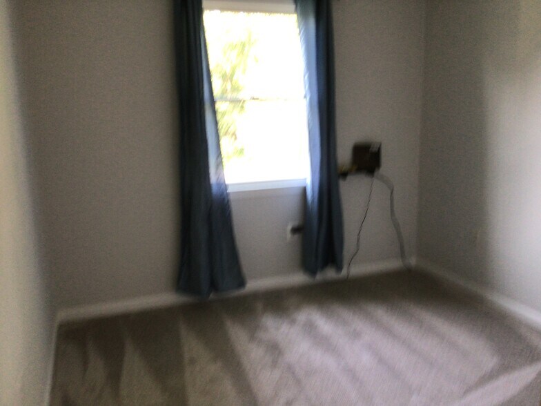 Modem in small office/ bedroom. Brand new carpet and paint. - 7288 Beechtree Ln
