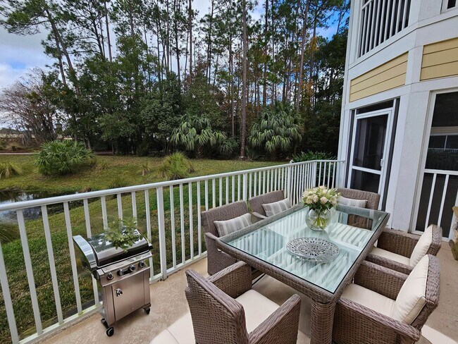 Building Photo - Spacious 3BR/3BA Ground-Floor Condo with W...
