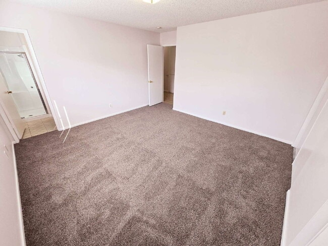 Building Photo - Spacious 4-Bedroom Oasis with Elegant Granite Touches in Vibrant Las Vegas!