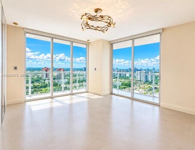 Building Photo - 16699 Collins Ave