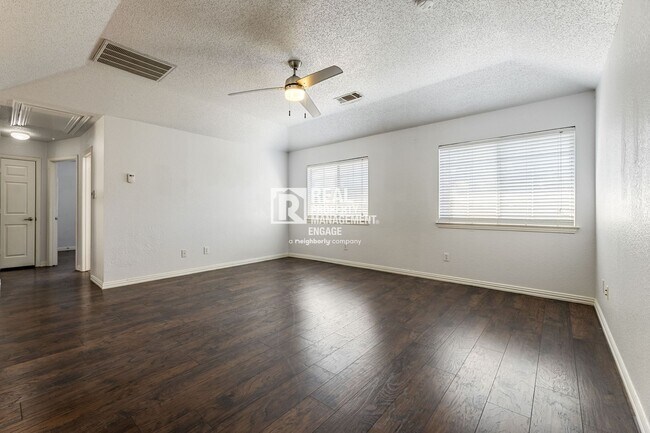 Building Photo - Recently Updated Plano Property with Modern Features and Serene Surroundings