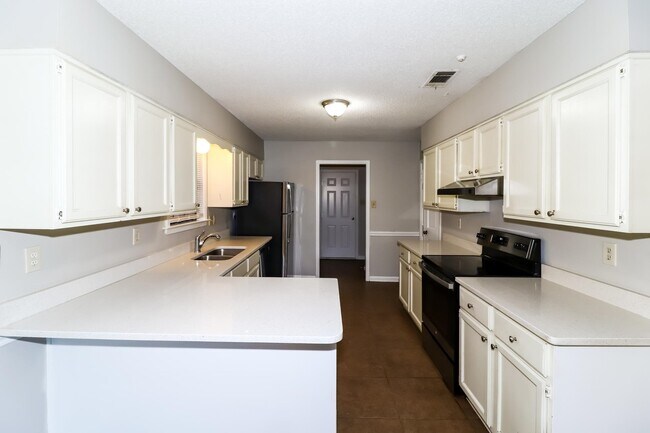 Building Photo - 4462 Garrison Ave