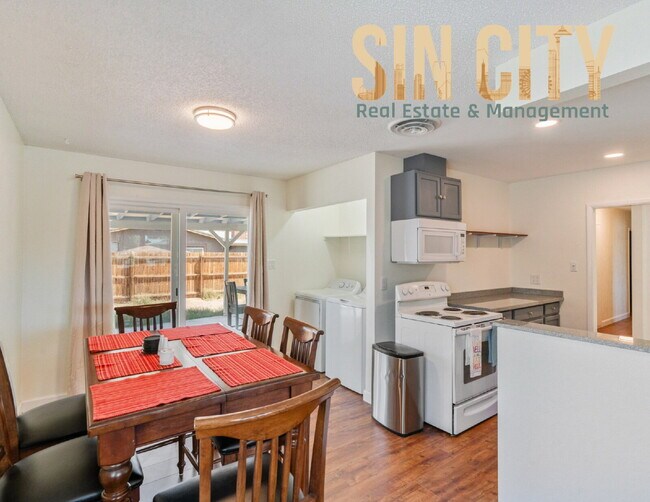 Building Photo - "Charming 4-Bedroom Retreat in Las Vegas –...