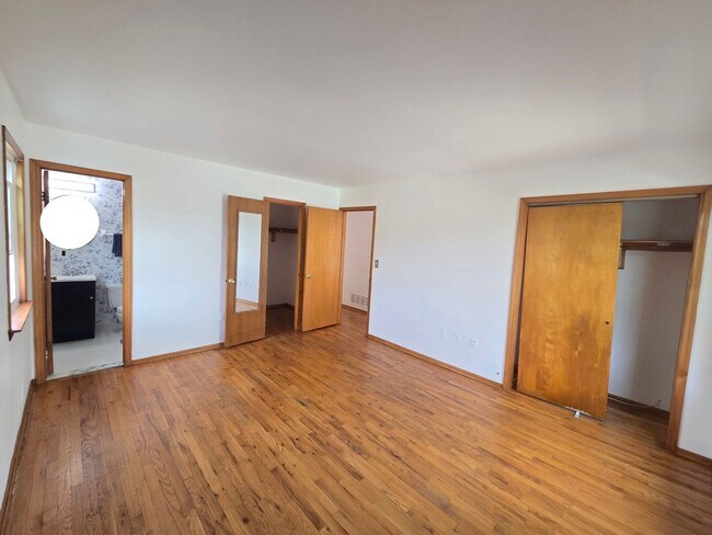 Building Photo - Updates abound at this SPACIOUS, half duplex with 3+ off-street parking spots, 3-bedrooms and 2 f...