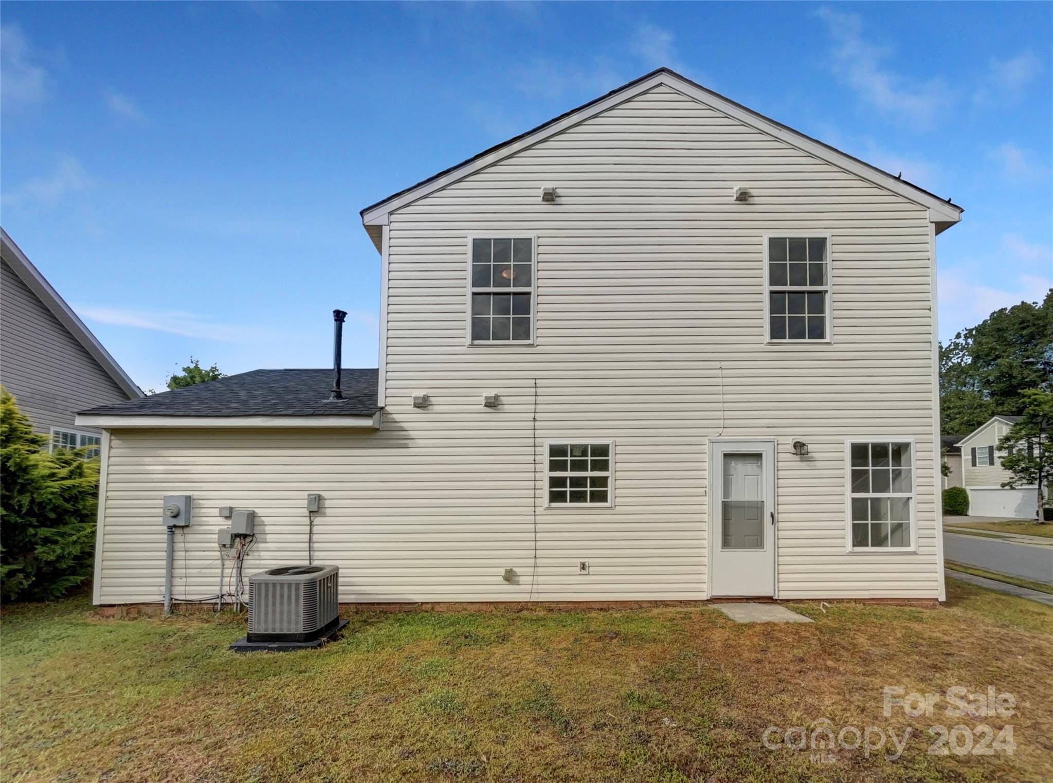 The back of the home is perfect for entertaining, with direct access to the kitchen and living room - 6903 Seney Dr