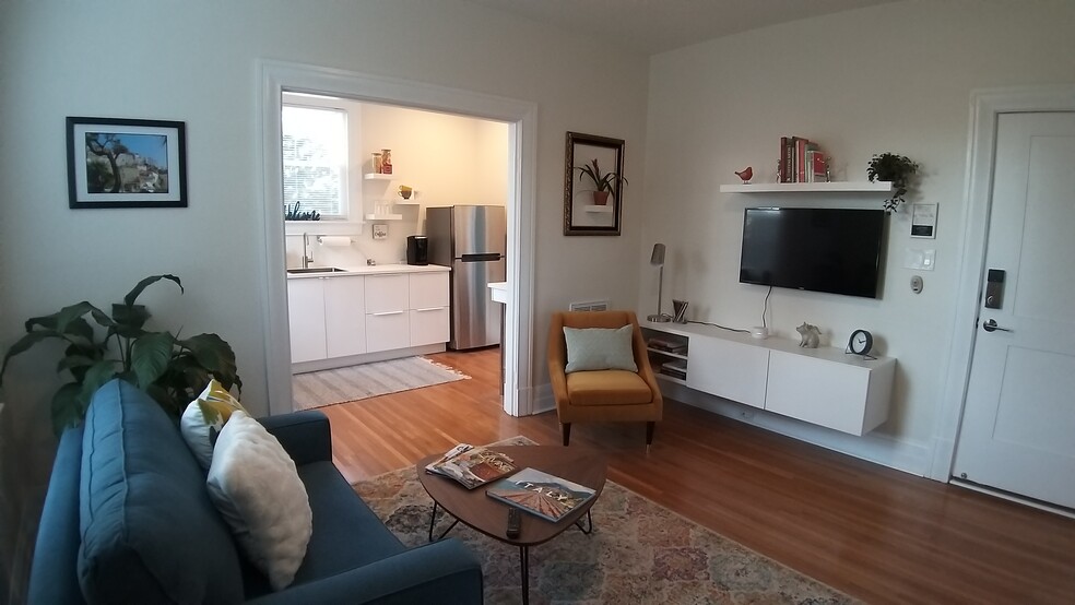 Modern, sleek, comfy living room. - 3541 Fort Ave