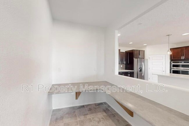 Building Photo - 6405 Kings Cyn Cv NE