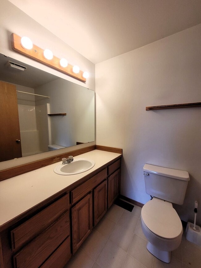 Building Photo - Charming Split-level 4 Bedroom Home - E Mc...