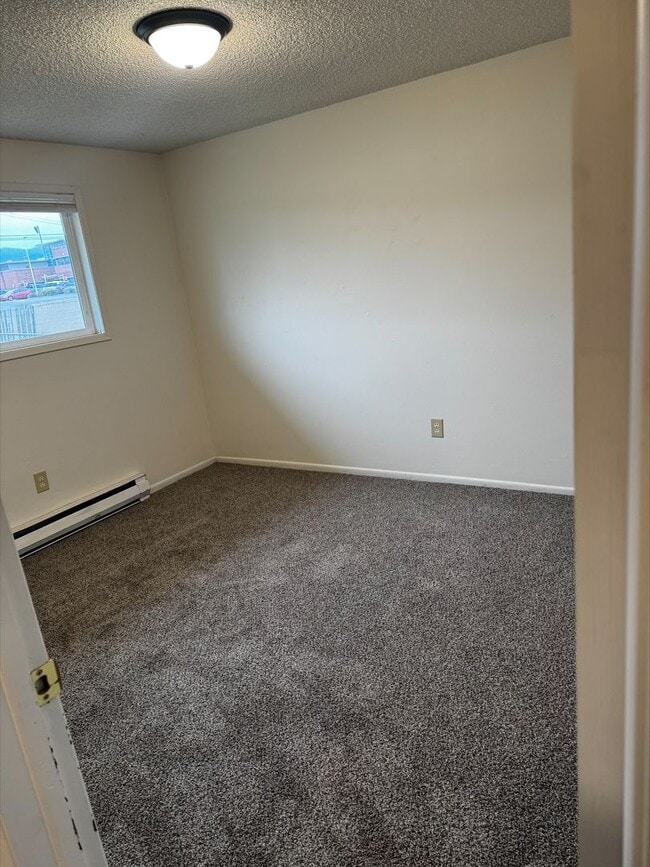 Building Photo - 12704-12706 E 31st Ave