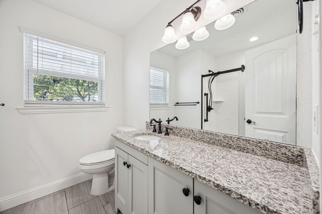 Building Photo - Stylish Renovation + Solar Savings in Prime Location