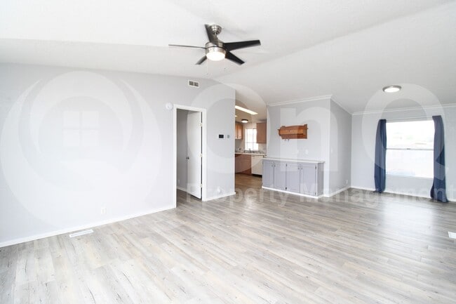 Building Photo - 9721 E Empress Ave