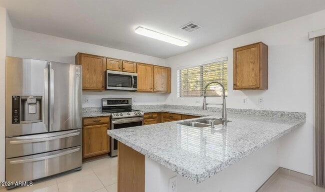 Building Photo - 9446 W Virginia Ave