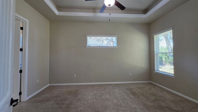 Building Photo - FOR RENT 4 BEDROOM 3 BATHROOM HOME