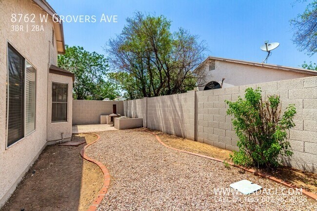 Building Photo - 8762 W Grovers Ave