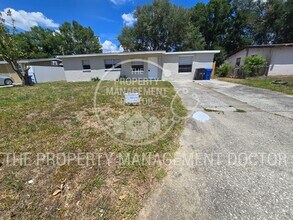 Building Photo - Spacious 4BR Tampa Home | Huge Fenced Backyard & Fresh Updates Throughout
