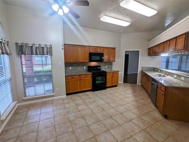 Building Photo - 3821 Pin Oak Dr N