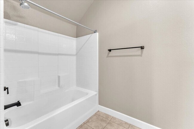Building Photo - 4-Bedroom Tuscany Townhome with Strip & Golf Course Views