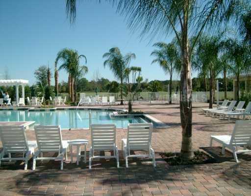 Building Photo - MOVE IN SPECIAL- Beautiful 3/2.5 Harmony Condo.