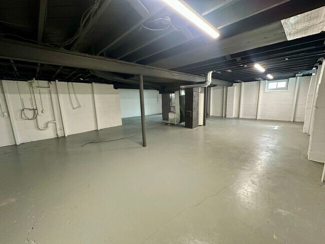 Building Photo - {5221} Updated Prairie Village Ranch + Fenced Yard + One Car Garage