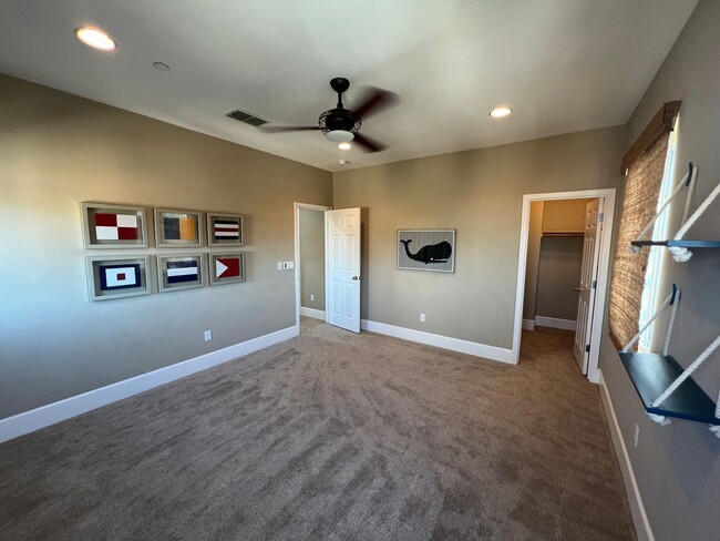 Building Photo - Former model home with tons of upgrades in...