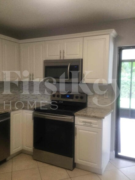 Building Photo - 5896 Triphammer Rd