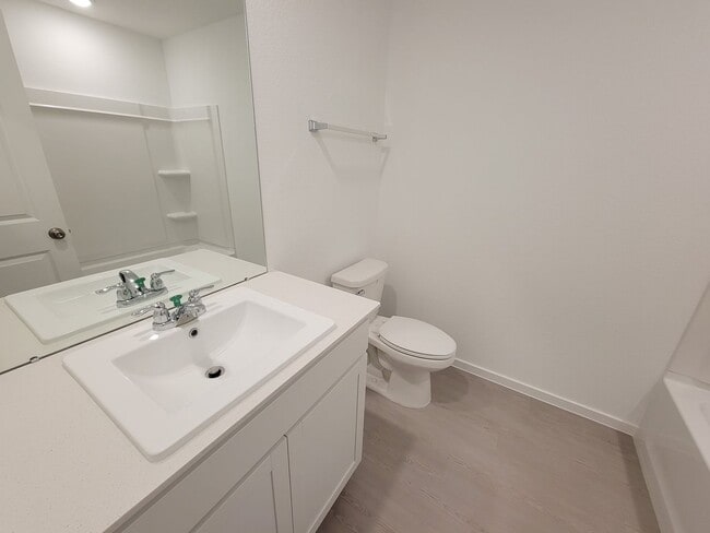 Building Photo - This lovely single-level home showcases a spacious open floorplan shared between the kitchen, din...