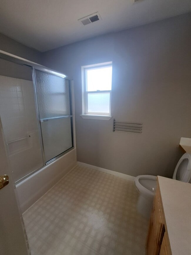 Building Photo - Beautiful setting 4 bedroom A/C Available Now