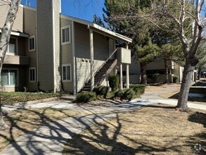 Building Photo - ENJOY THE POOL THIS SUMMER IN THIS GATED C...