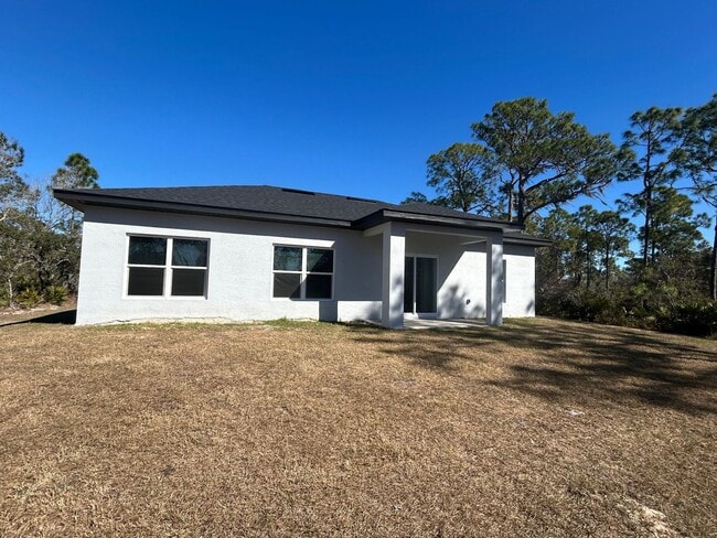 Building Photo - SPACIOUS 4 BEDROOM- 2 BATHROOM RETREAT IN BEAUTIFUL LAKE PLACID