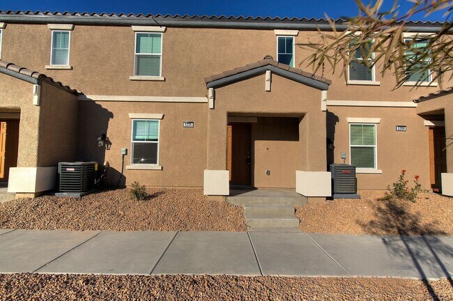 Building Photo - Newer Townhome - 3 Bedrooms + 2 Car Garage - E Craig & Nellis