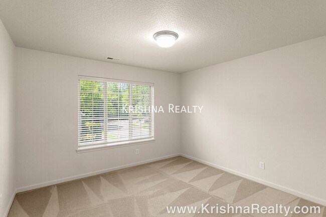 Building Photo - 13470 NW Alvada St