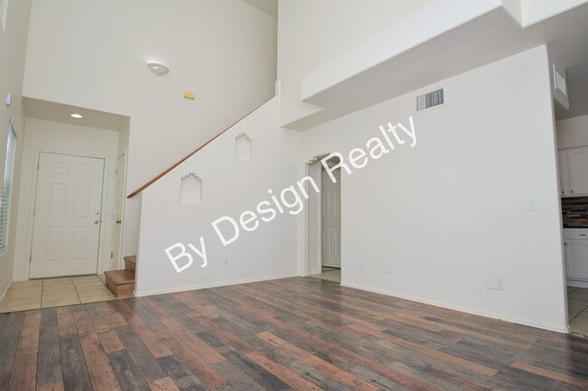 Building Photo - Updated SE Tucson 3BR/2.5BA Gem: Cathedral Ceilings & Private Wash Views