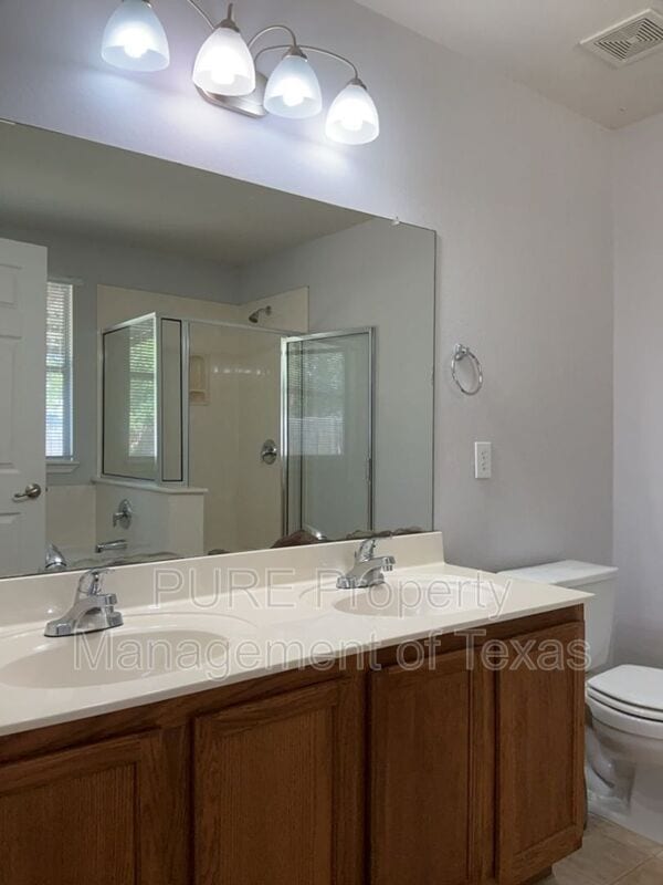 Building Photo - 9005 Sun Shower Bend