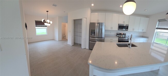 Building Photo - 10500 SW Vasari Way