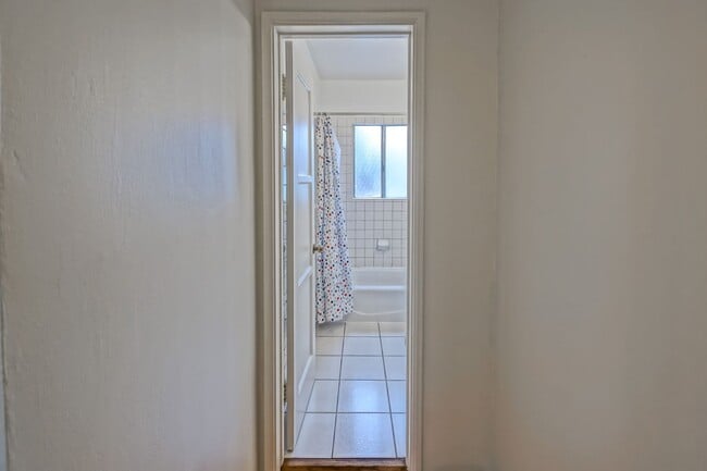 Building Photo - Bright & Charming, Single Story 3BR2BA Home w/ Large Front Yard, Huge Fenced Rear Yard w/ Large D...