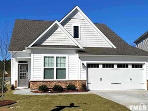 Building Photo - Main Floor Owner's Suite PLUS Main Floor G...