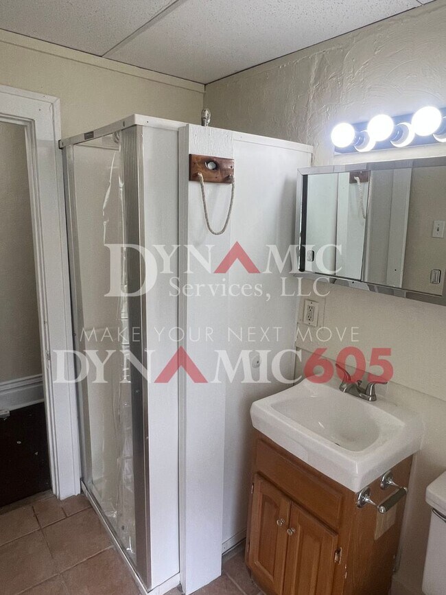Building Photo - Studio with Bathroom - All Utilities Paid ...